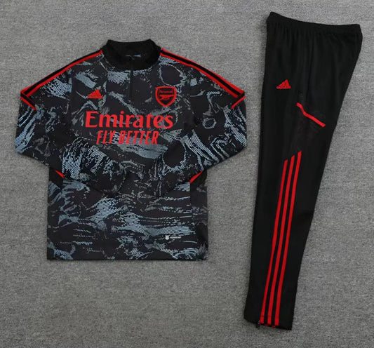 Arsenal Camo Tracksuit laid flat, showcasing its unique pattern.